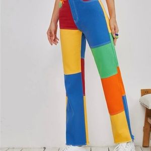 Brand new with tags attached color block high waisted jeans. Super cute!